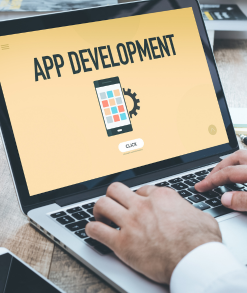 Professional team working on mobile app designs and coding, with visuals of smartphones, app interfaces, and collaboration tools, symbolizing expertise and innovation in mobile app development.